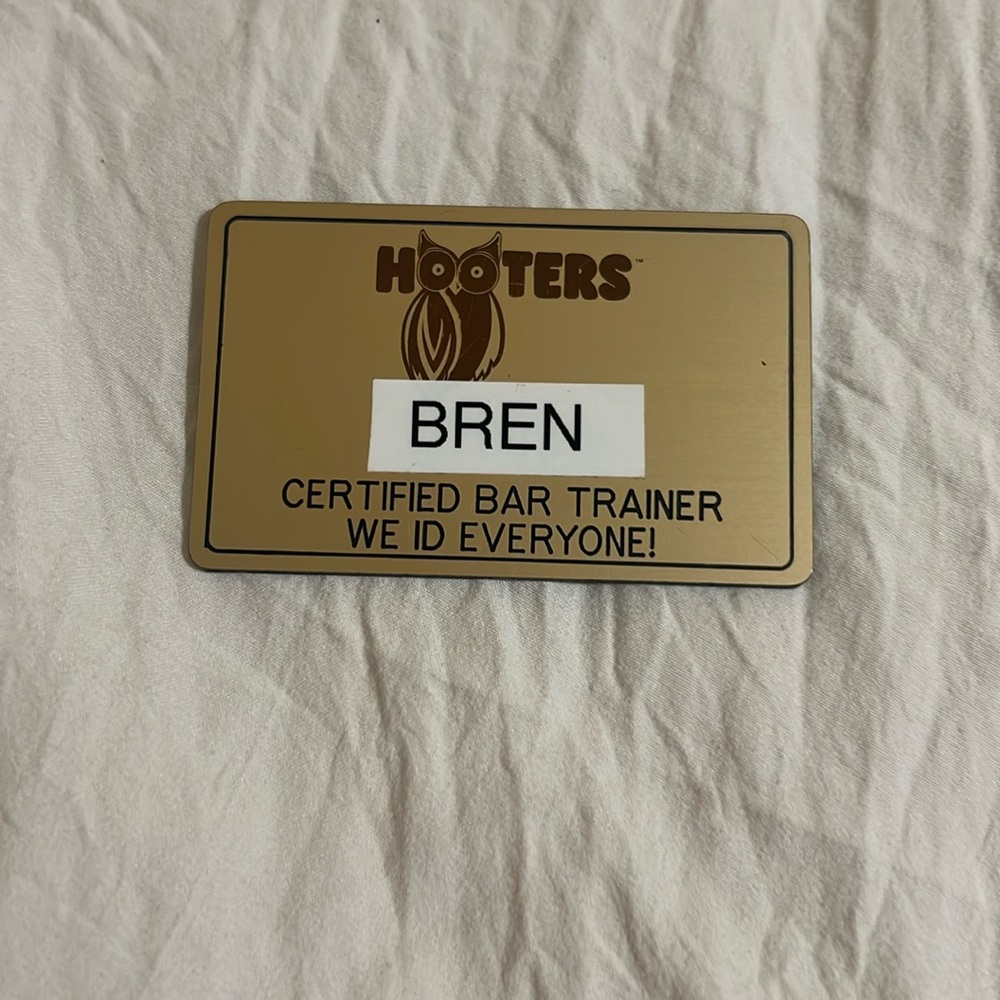 Hooters name tag.